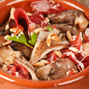 Recept: “Tapa” champignons met ham en pijnboompitten